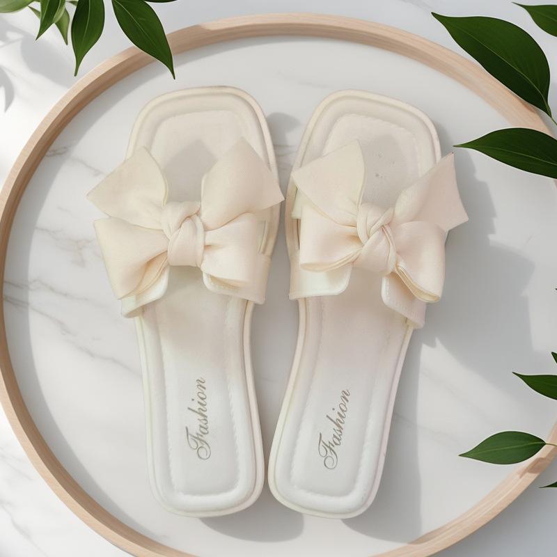 

Шлепанцы с бантом женские летние для ношения новая модная милая девушка плоская подошва нескользящие фея ветер слово крутые шлепанцы женские 38-39 белый