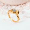 Delicate Leaf Wrap Gold Labradorite Ring: Nature-inspired Gemstone Jewelry with a Small, Iridescent Stone and Sculpted Leaf Band.
