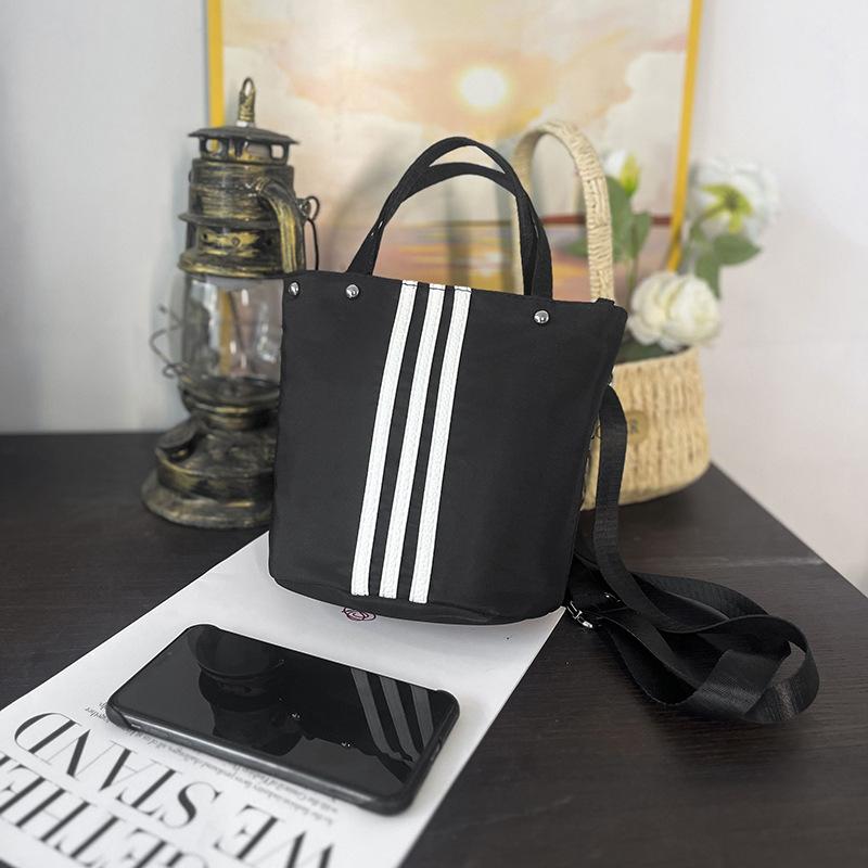 Casual simple lightweight bag women's summer new fashion nylon bucket bag commuter shoulder bag