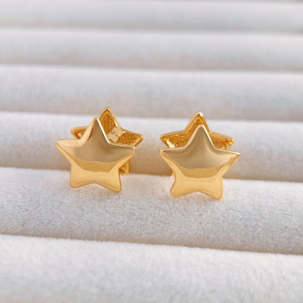 

Electroplated 18k Gold Five-Pointed Star Ear Cuffs: European & American Fashion, Women s High-End Niche Design Earrings.