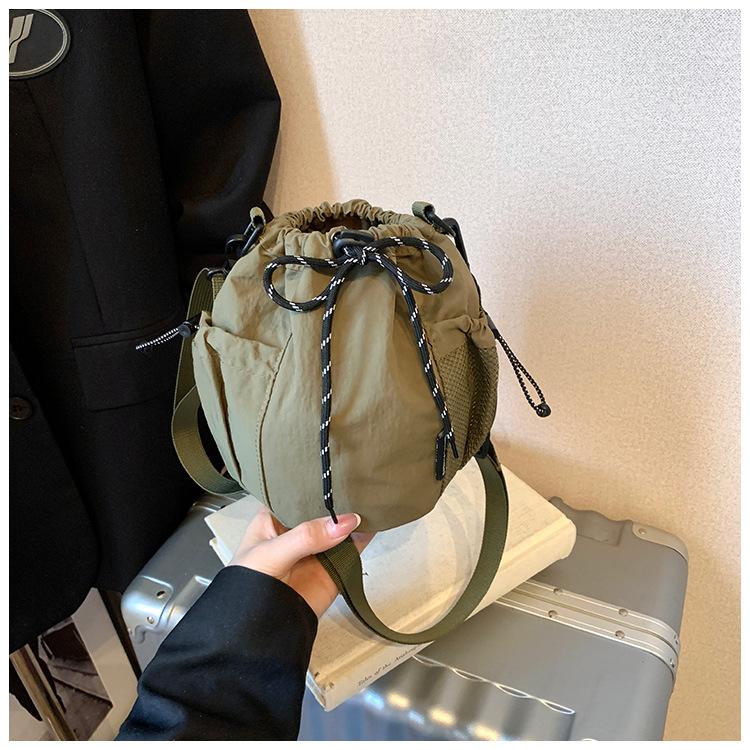 Canvas-Tasche Damen 2025 neue trendige Marke Handy-Tasche Freizeit Sport Reise Umhängetasche kleine Eimertasche