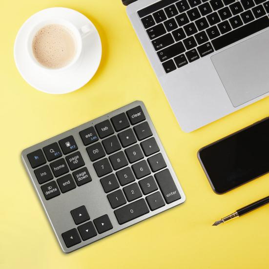 Mini numerická klávesnice 2,4G bezdrátová Bluetooth kompatibilní s duálními režimy 35 kláves Tichý přenosný notebook Klávesnice pro telefon Počítačové příslušenství