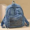 Zaino con rivetti lavato in denim zaino di grande capacità