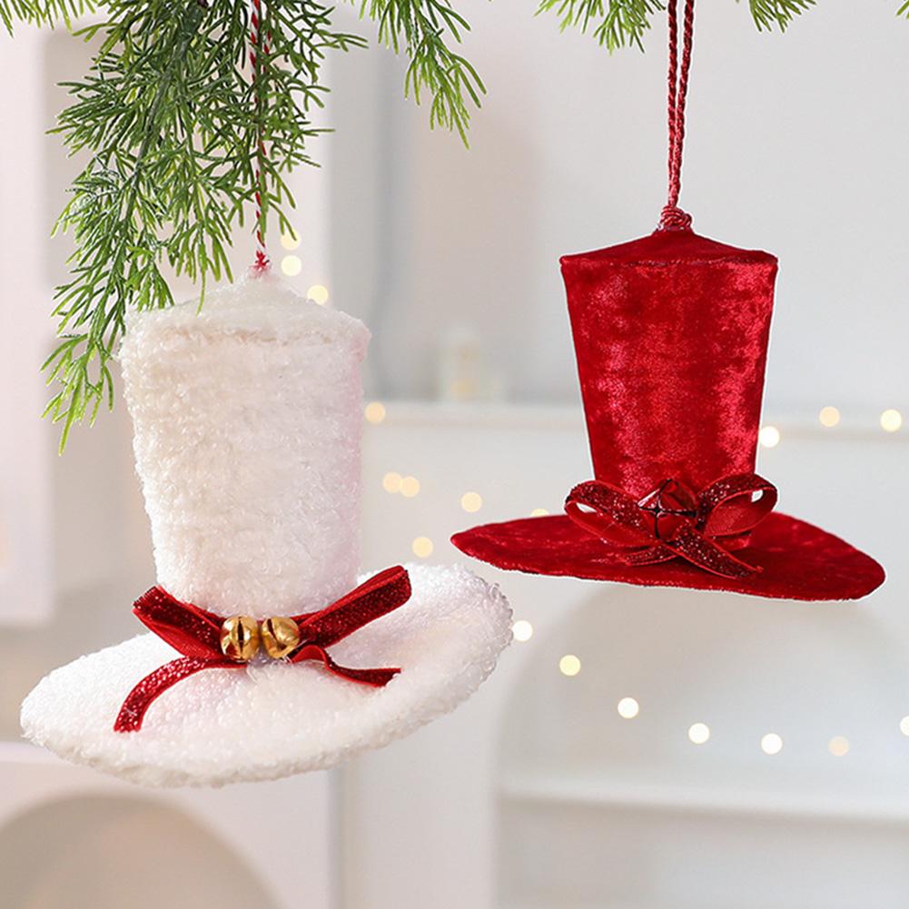 Set of 4 holiday fabric top hat ornaments featuring ribbon and bell accents for a cozy and elegant Christmas tree decoration