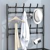 Standing clothes rack for shoes in the hallway with shelves, black, wardrobe