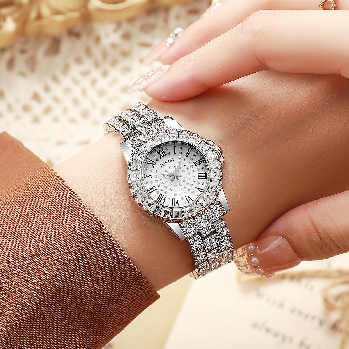 

Women s exquisite high profile level Roman numerals dial diamond dial full diamond steel band quartz watch.