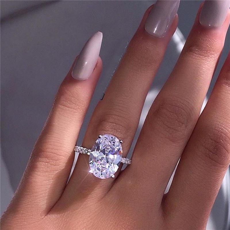 

2023 European Style S925 Silver Oval Zircon Ring with White Gold Plating Size 5