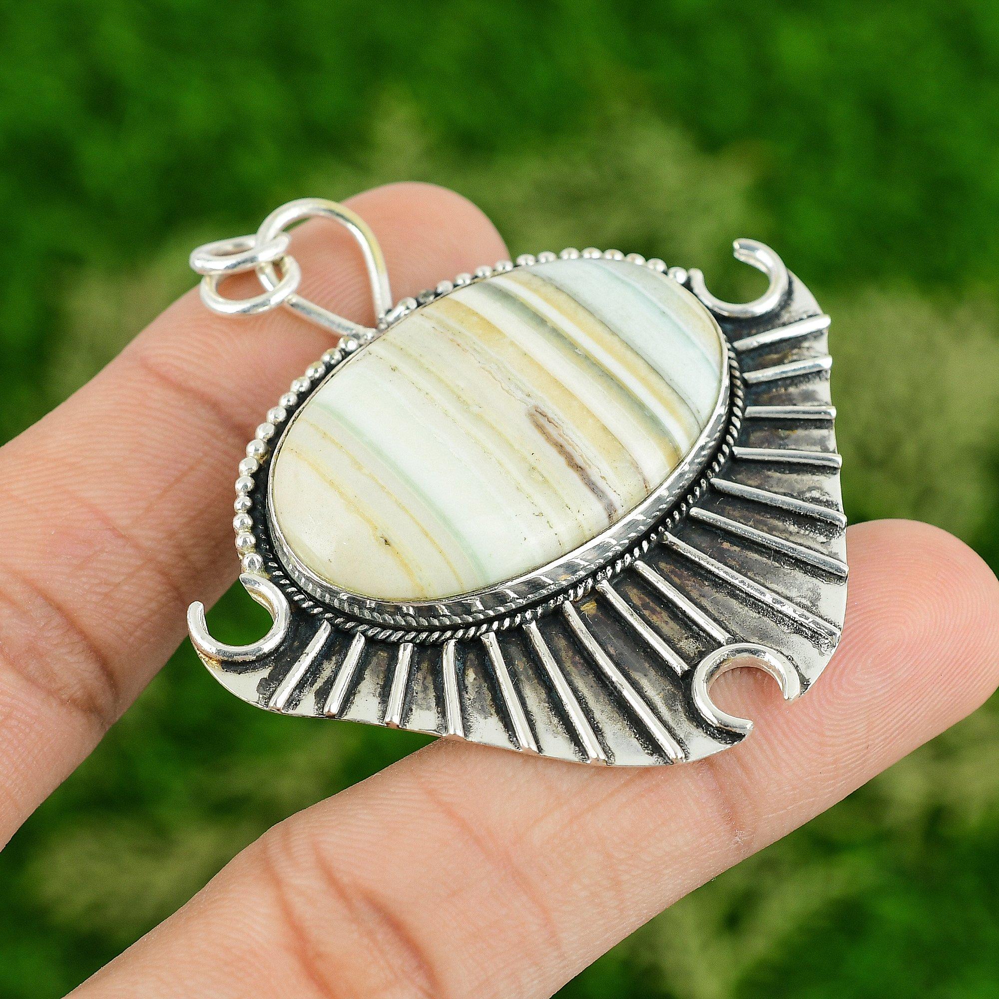 

Sisters Day Deal Oval Blue Rhodochrosite Gemstone 925 Sterling Silver Pendant