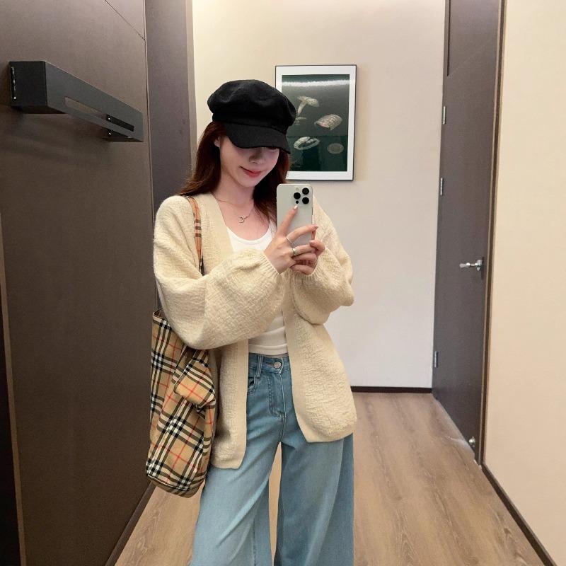 Autumn and winter new lazy style bark pattern fashionable versatile loose medium and long bubble sleeve knitted sweater jacket women
