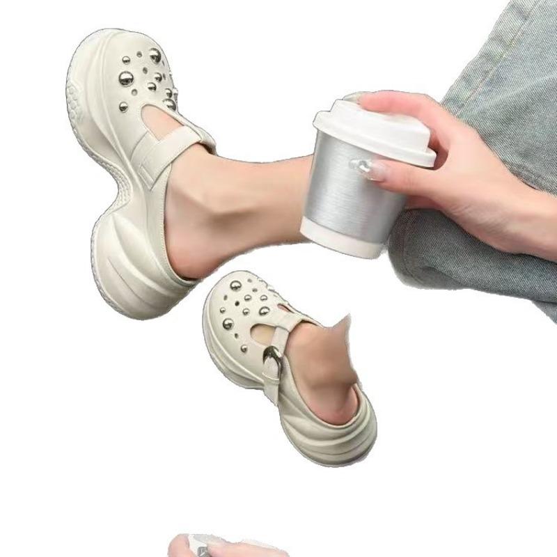 Fashion leather outer wear round head hole shoes women's new thick sole height increase small rivet hollow bag head drag