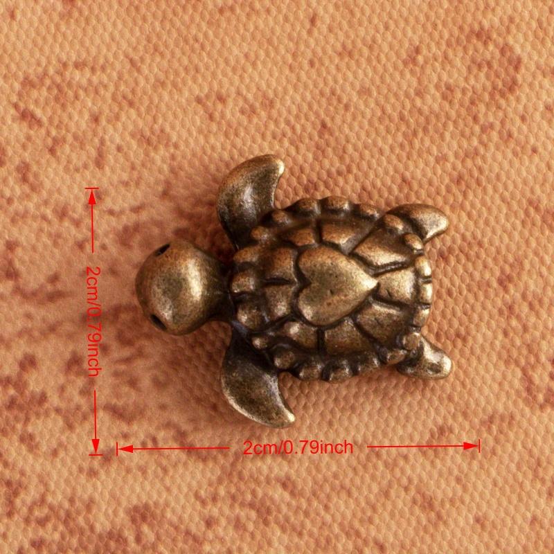 

Vintage Turtle Figurine, heart-shaped details, mini marine decor for desk,shelf, or TV stand. Perfect gift for home & office!