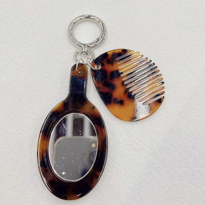 Neuankömmling Kreativer Harz-Kamm Schlüsselanhänger Essigsäure Spiegel Kammform Anhänger Schlüsselring Frauen Täglicher Gebrauch von Taschenzubehör