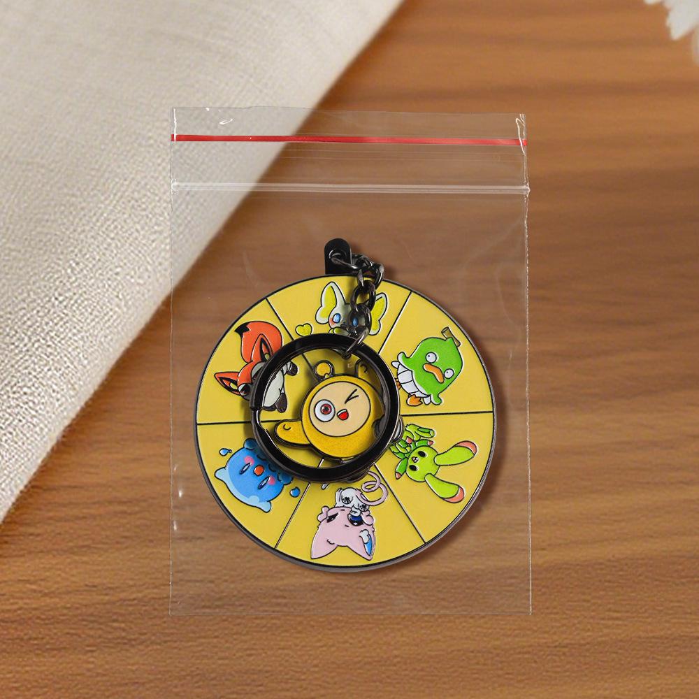 Egg Party Rotating Cartoon Animal Keychain: Classic Game Accessory and Children's Gift