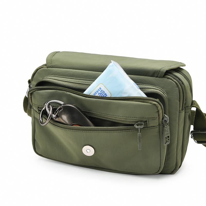 Kompaktní crossbody taška s více kapsami na zip pro muže a ženy