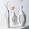 Nordic Geometric Ceramic Vase - Creative Art Ornament for Living or Model Room, Korean Style Decor.