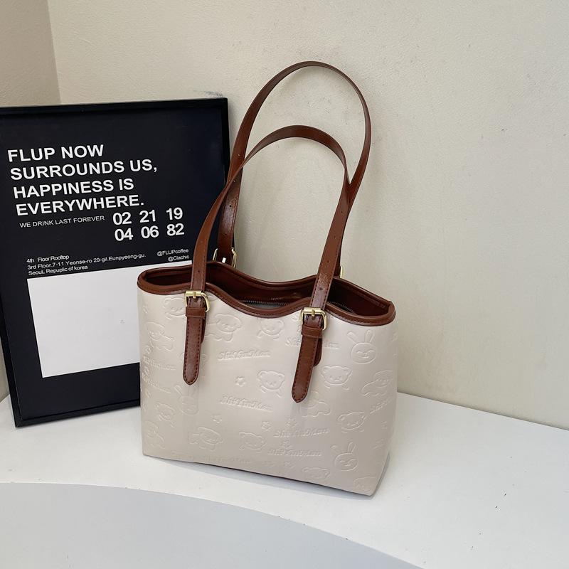 High-end contrasting color large-capacity bag women's 2025 new fashion commuter shoulder college student portable tote bag