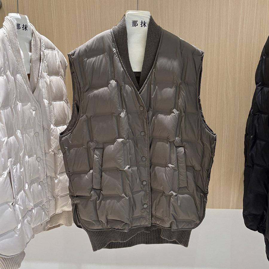 Autumn and winter loose fashion knitted splicing fake two pieces V-neck winter down vest jacket thermal vest tide