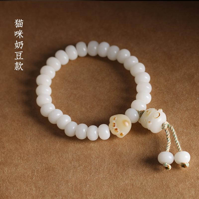 

Charcoal-burned cat paw bracelet, bodhi root bracelet for girls, cute little cat bracelet with white jade bodhi in a roasted color, niche bracelet Bodhi Cat Claw Bracelet -