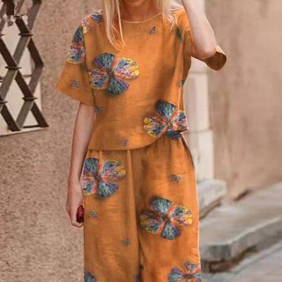 2 pezzi/set da donna T-shirt pantaloni tuta scollo a V manica corta stampa top largo elastico in vita gamba larga nono pantaloni casual da indossare tutti i giorni top pantaloni set
