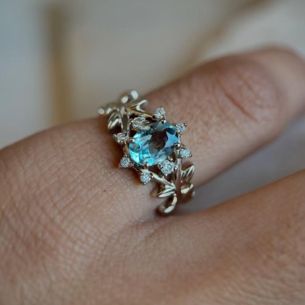 New gold-plated ring with aquamarine gemstones Leaf-shaped creative women's ring, simple and stylish