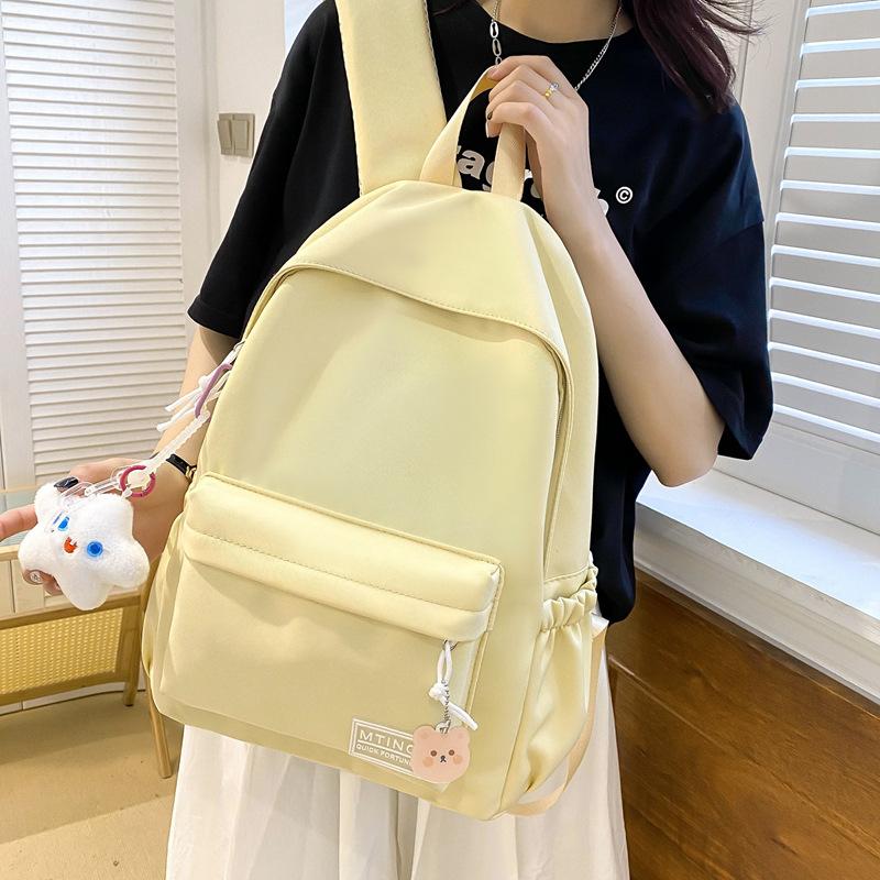 Small fresh girl backpack Japanese solid color schoolbag female Korean version ins versatile large capacity student backpack new