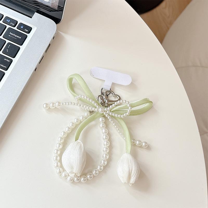 

Small Fresh Tulip Pendant, Pearl Bow, Mobile Phone Case Hanging Chain, Anti-Drop And Anti-Lost Backpack Pendant.