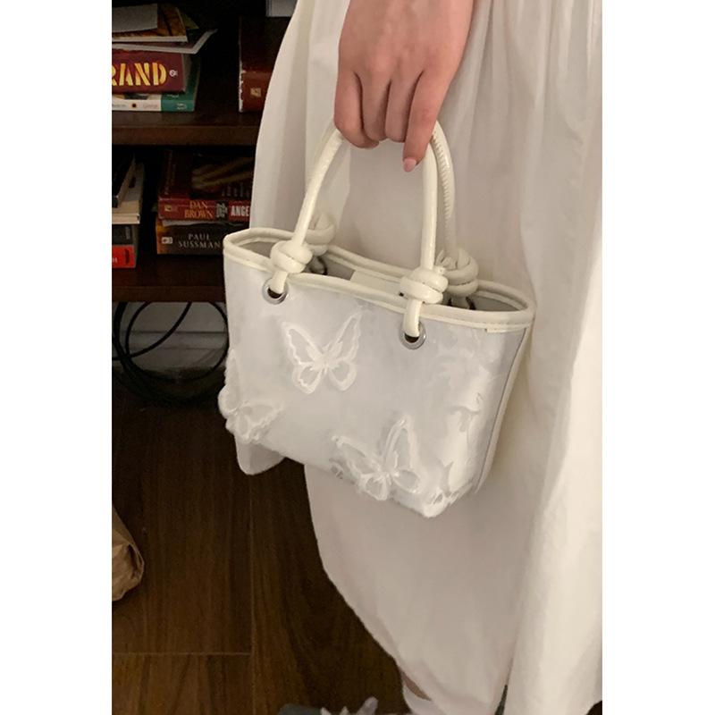 Niszowa torebka pod ramię damska nowa moda niszowa przenośna mała torba tote na ramię listonoszka