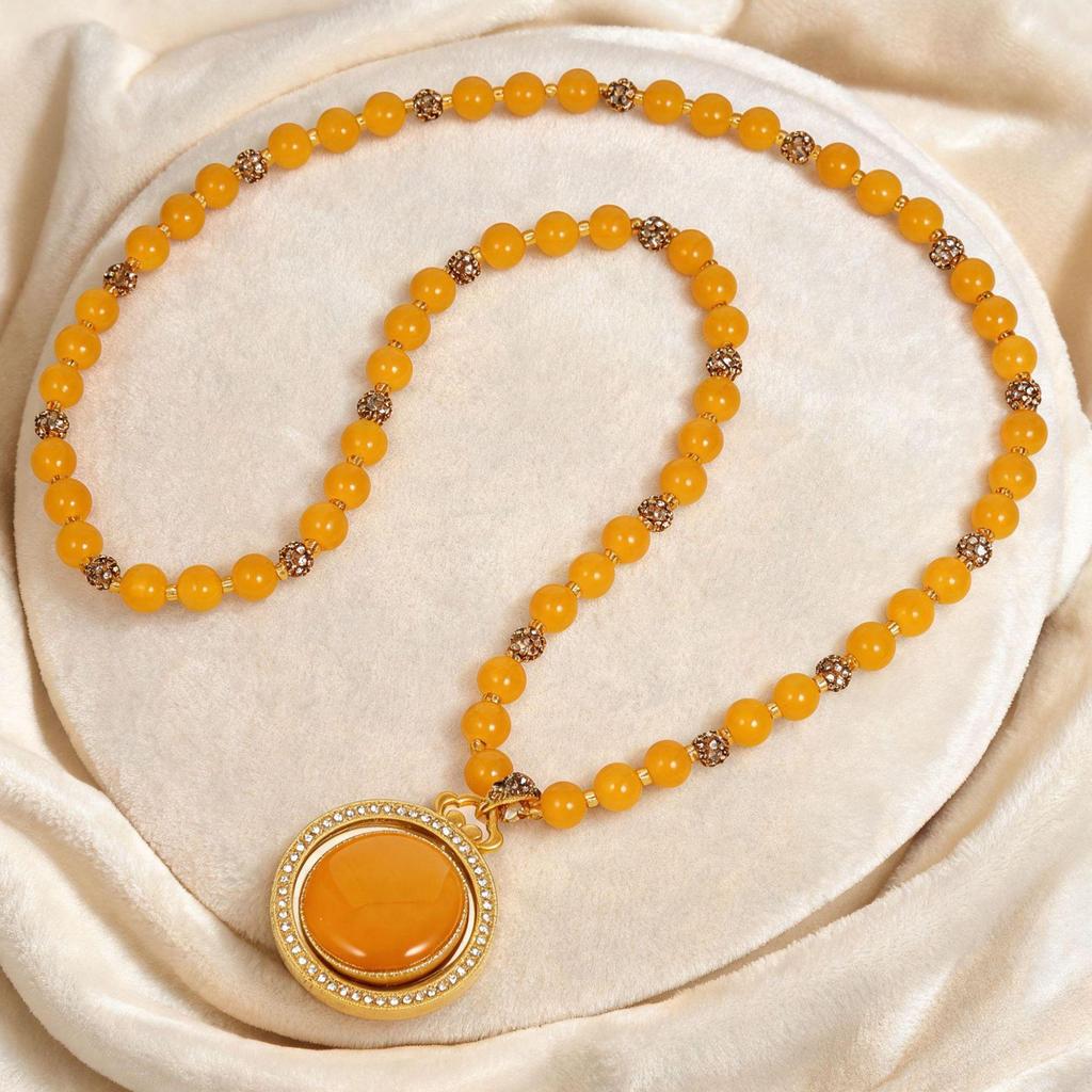Chinese Yellow Jade Double-Sided Golden Buddha Pixiu Necklace – Elegant Women’s Pendant for Wealth and Luck.