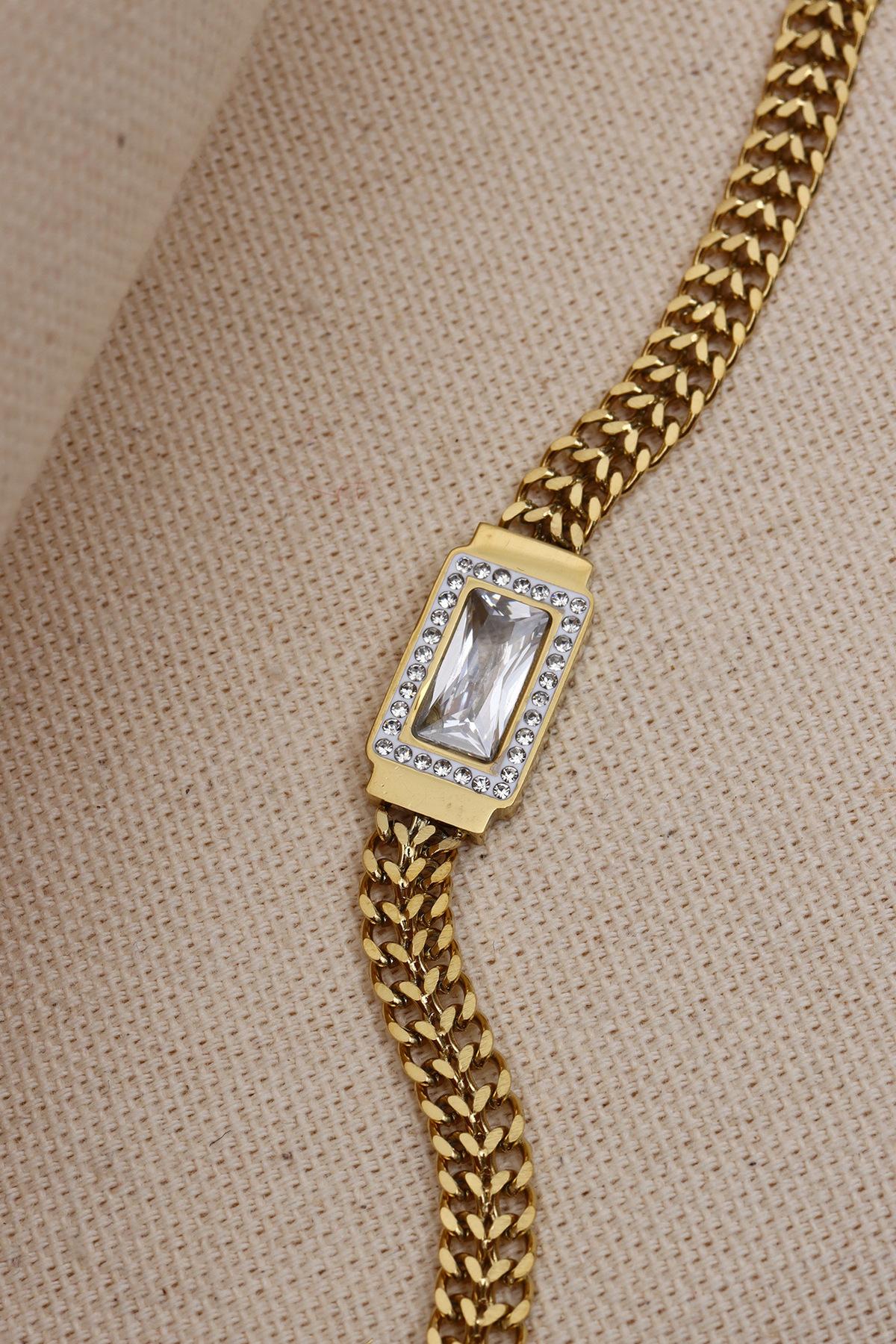 

Браслет-цепочка из стали золотистого цвета с камнем Baguette