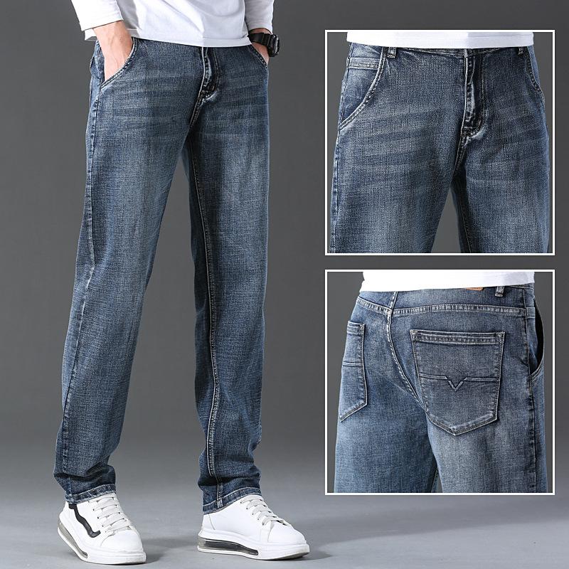 Men's jeans straight leg loose trendy youth pants men's business elastic youth four-season trousers
