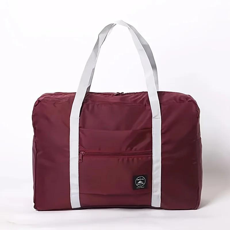 

Portable and lightweight travel luggage bag, large capacity sports and fitness bag, foldable handheld boarding bag