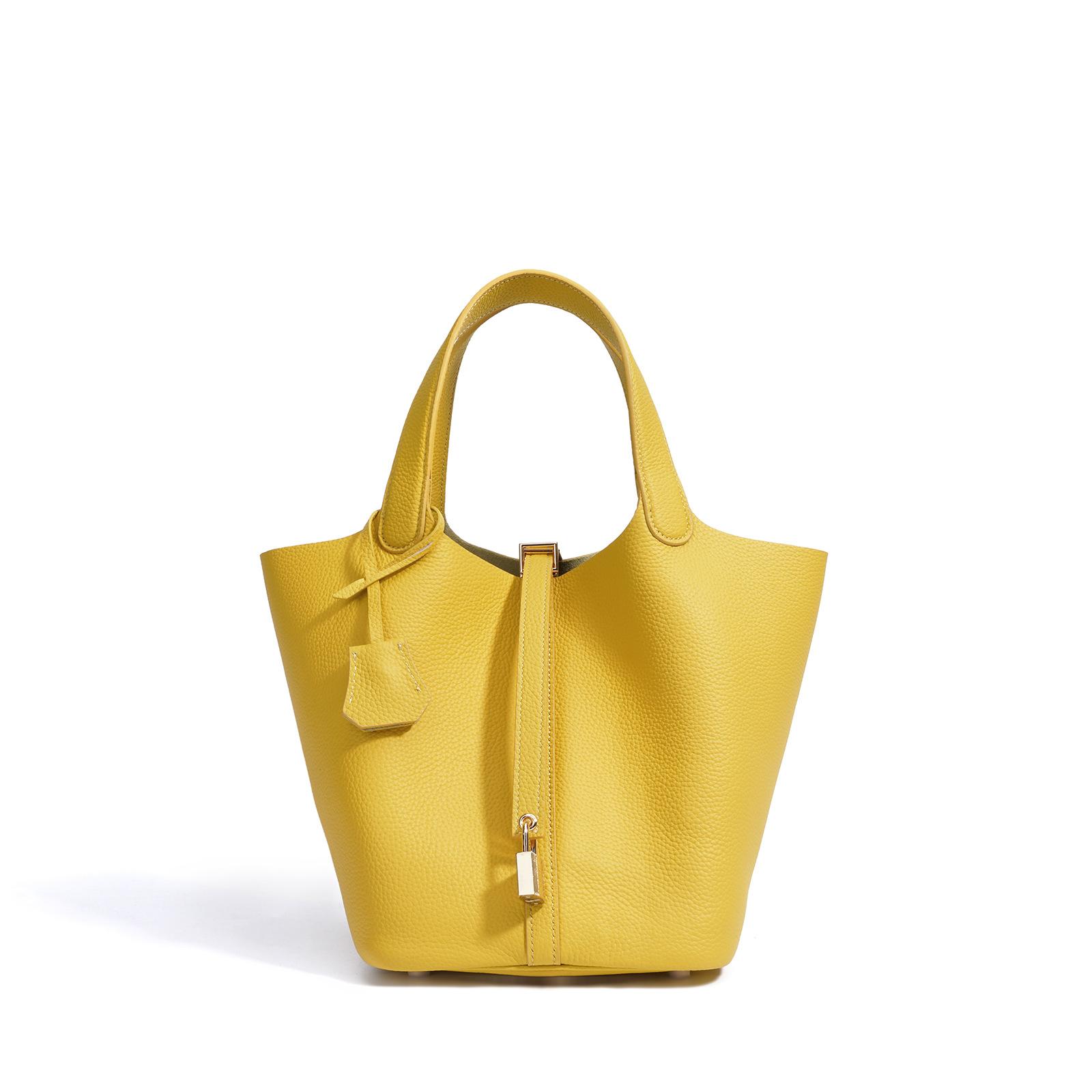 

Simple women s bag feeling leather bag commuter vegetable basket bucket 2026 black leather handbag new