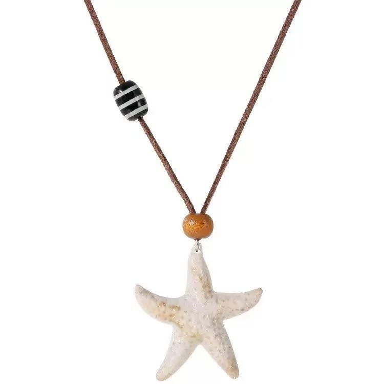 Summer vacation style starfish pendant necklace women's sweet and cute beaded star sweater chain new versatile accessories