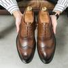 Men's 2025 Spring/Autumn British Style Brogue Leather Shoes: Pointed Toe, Large Size, Casual & Formal Wear, Breathable Design.