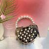 Stylish and Simple Beaded Pearl Bag Dinner Bag Hollow Semicircular Handbag Metal Bucket Bag