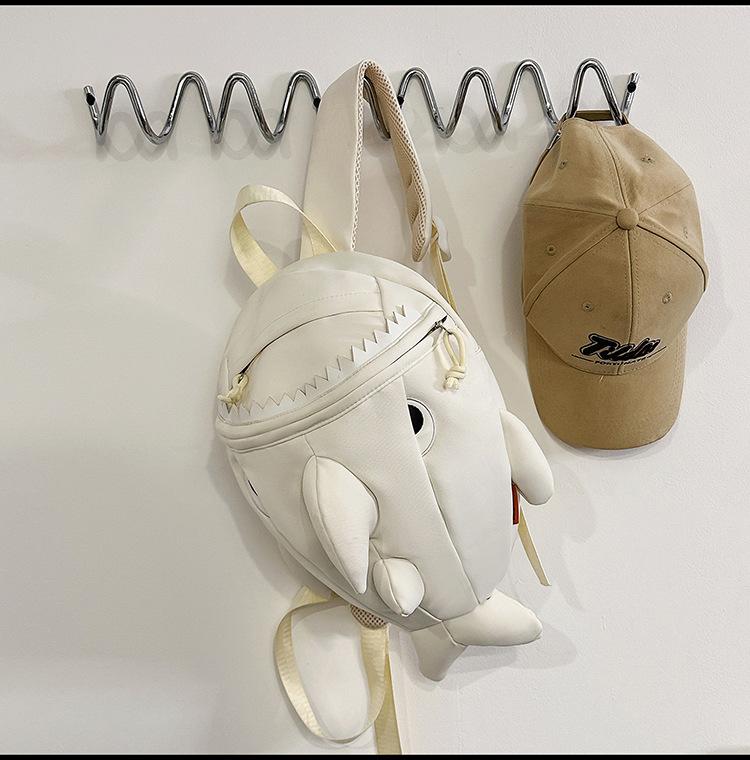 Cartable nouveau requin créature monstre créative sac à dos hommes et femmes dessin animé mignon sac à dos personnalité drôle étudiant célébrité Internet tendance sac d'école