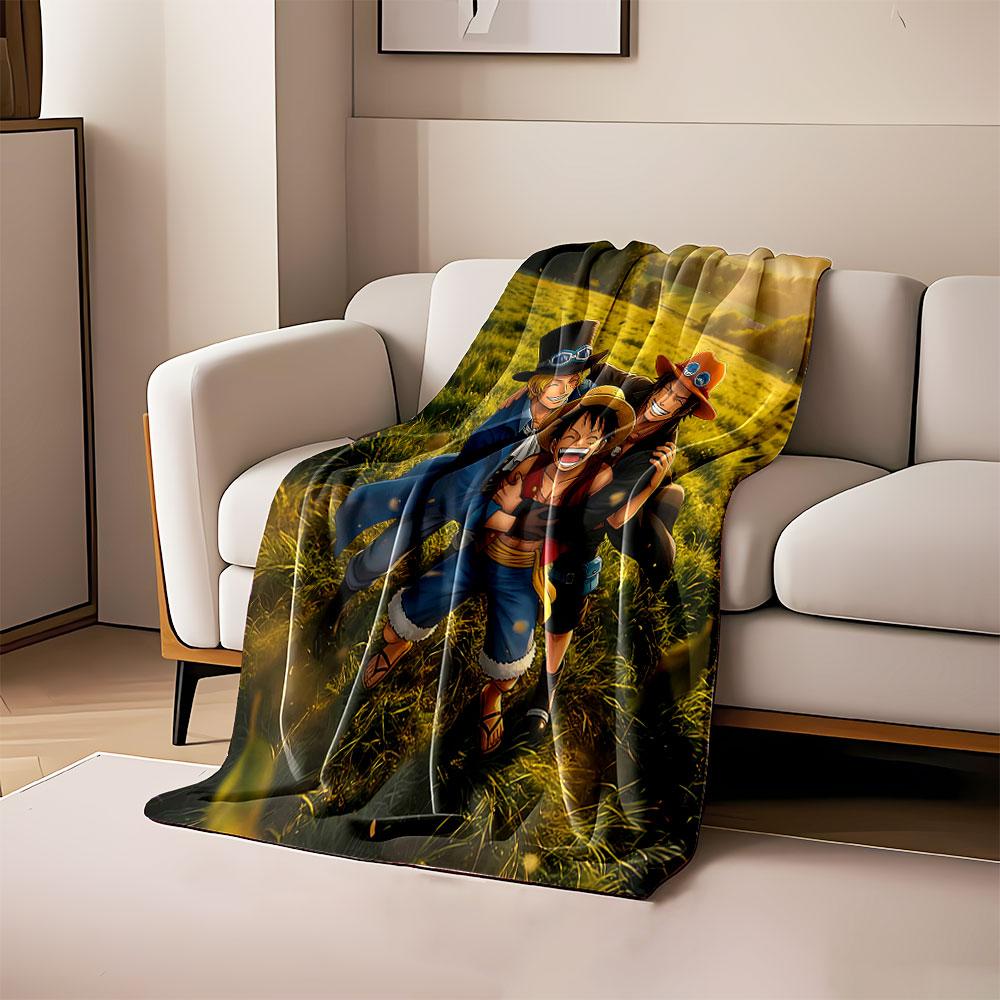 

Three individuals in adventurous outfits embracing in a grassy field. for all seasons blanket lunch break throw gift 80cm x 120cm