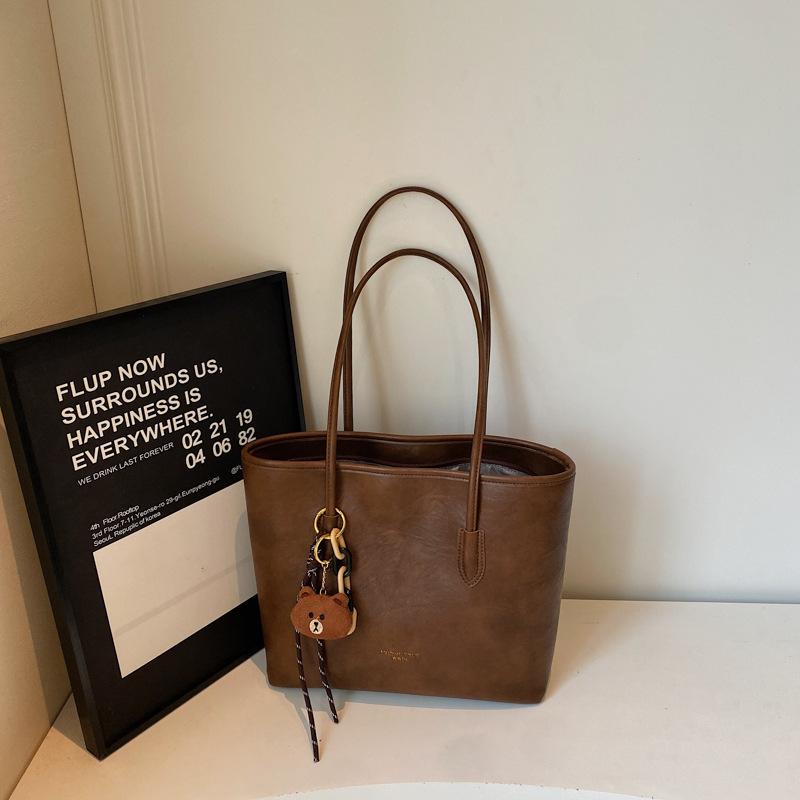 

Fashion commuter simple large-capacity tote bag women s bag autumn and winter new retro armpit bag shoulder bag Without pendant коричневый