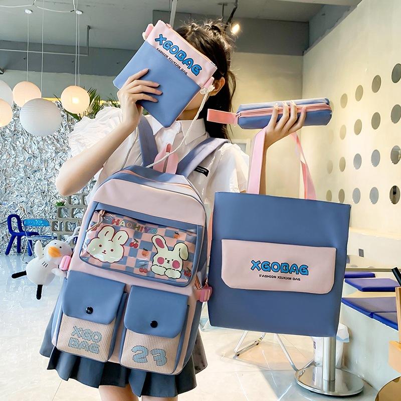 School bag, women's backpack, four-piece set, junior high school student backpack, campus college backpack.