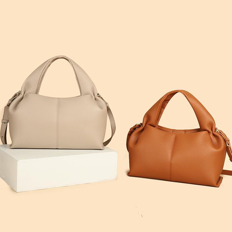 

Сумка Polene Cloud 2024: Универсальная однотонная сумка-пельмень через плечо для женщин. small чёрный