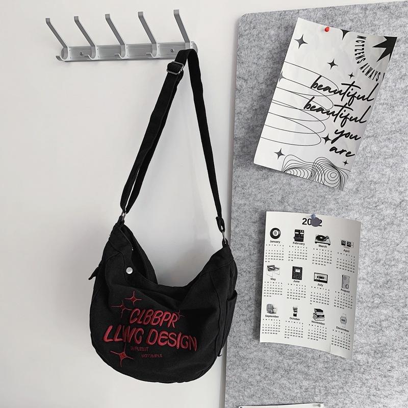Canvas bag female college student class ins lazy wind large capacity shoulder messenger bag niche letter dumpling bag