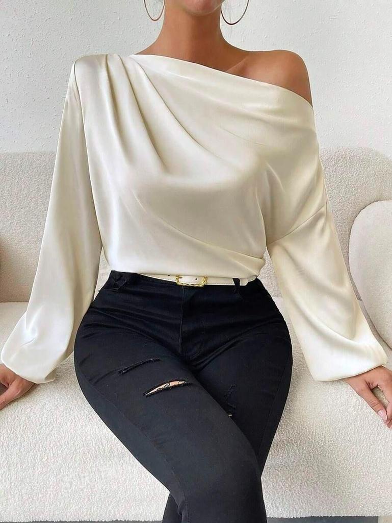 Top a maglia da donna in raso asimmetrico a maniche lunghe con design a spalla obliqua