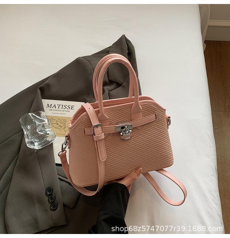2025 new niche simple casual bucket bag women's one-shoulder crossbody bag cute retro hand-held shell bag