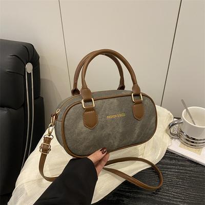 Hand Carrying Retro Bowling Bag Women's 2025 Summer New Fashion Casual Shoulder Bag Niche High Value Messenger Bag