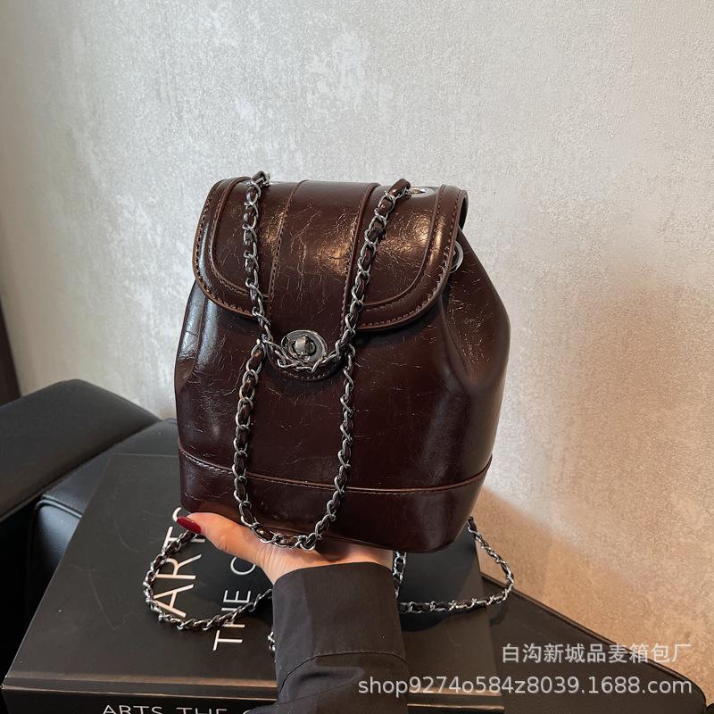 

2025 new niche chain bag women s small fragrant wind bucket bag pu leather backpack fashion single shoulder oblique span bag темно-коричневого