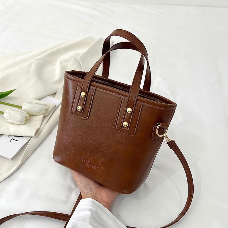 

Высокий ЯНЧЖИ ретро маленькая сумка женская 2025 новая мода универсальная сумка-мессенджер модная портативная сумка-ведро коричневый