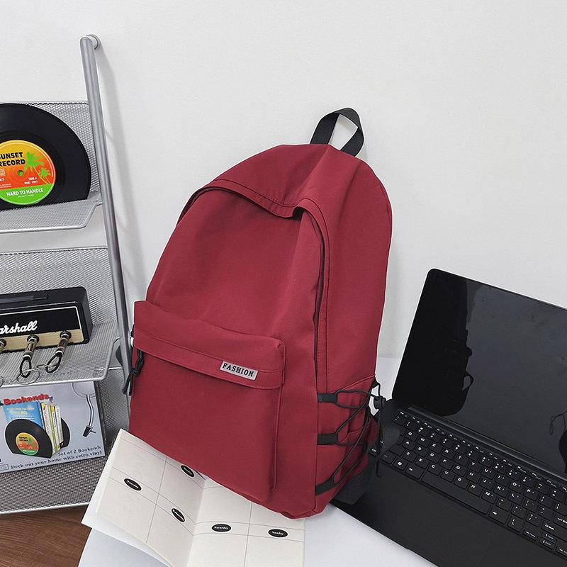 New Casual Backpack Simple College Style Backpack Large Capacity Student Bag Men and Women Couple Bag Travel Bag