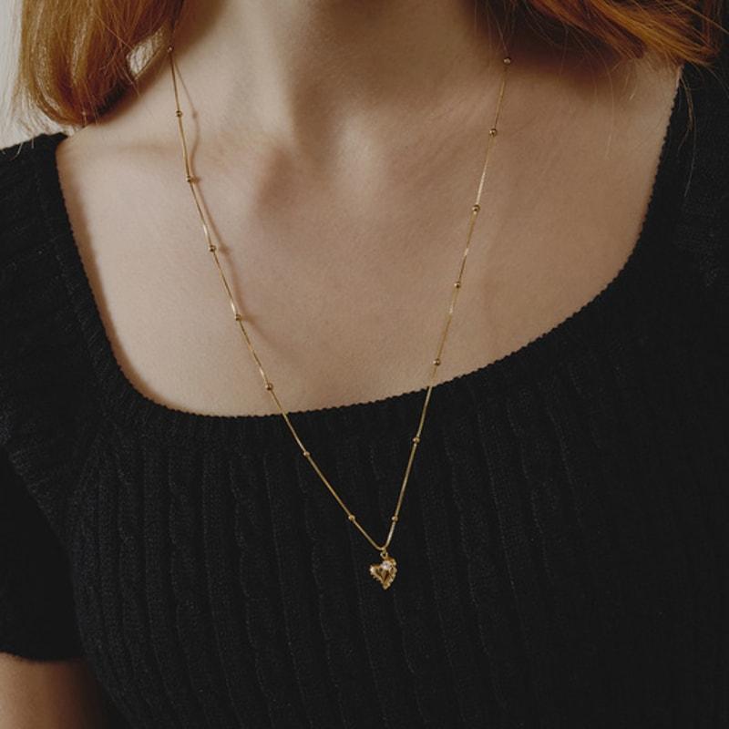 eenie beenie made by bayou heart long necklace