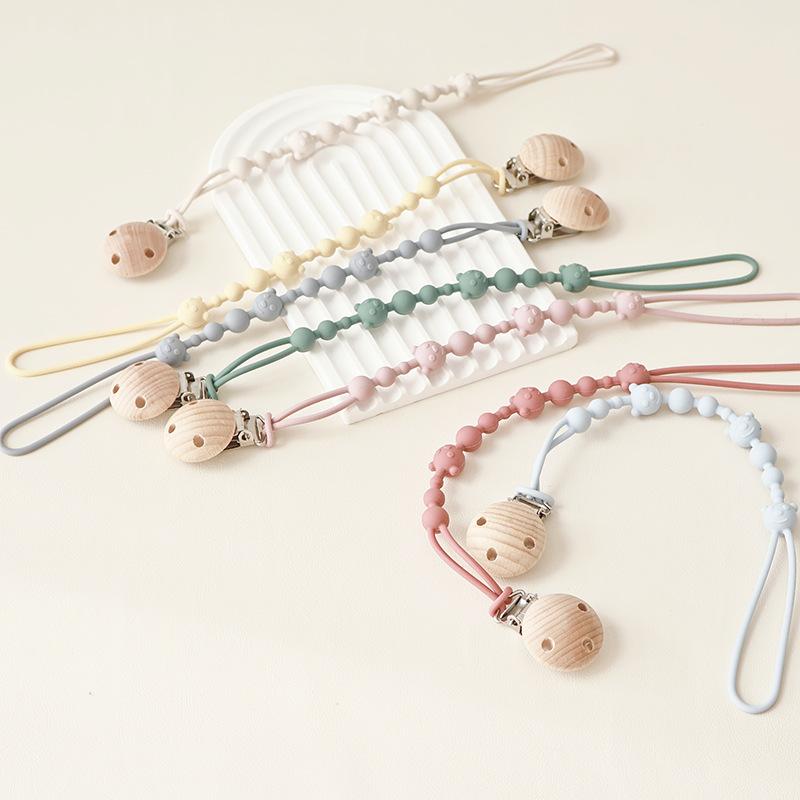 Solid Color Silicone Pacifier Chain Clips Baby Boys Girls Pacifier Gum Chain Bite Music Teeth Grinding Stick Toy Anti Loss Rope