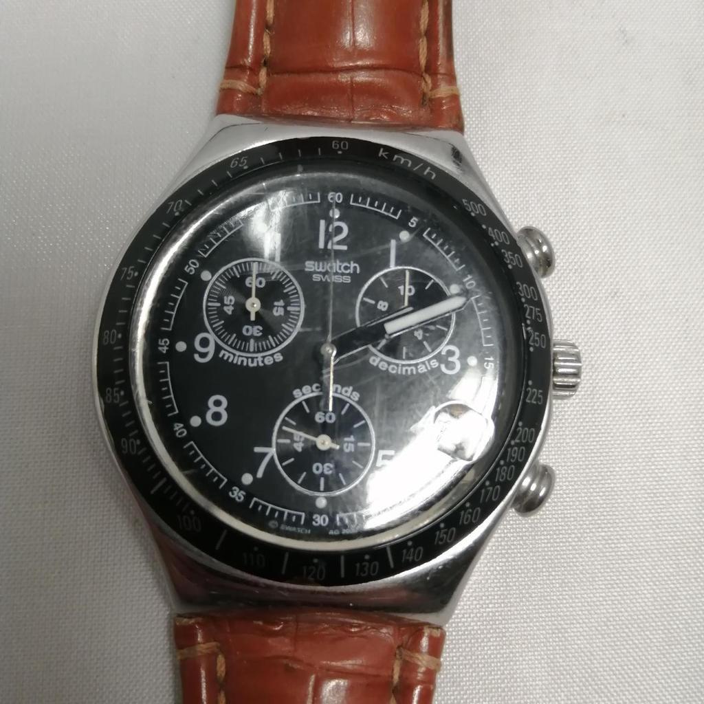 Used SWATCH black brown watch